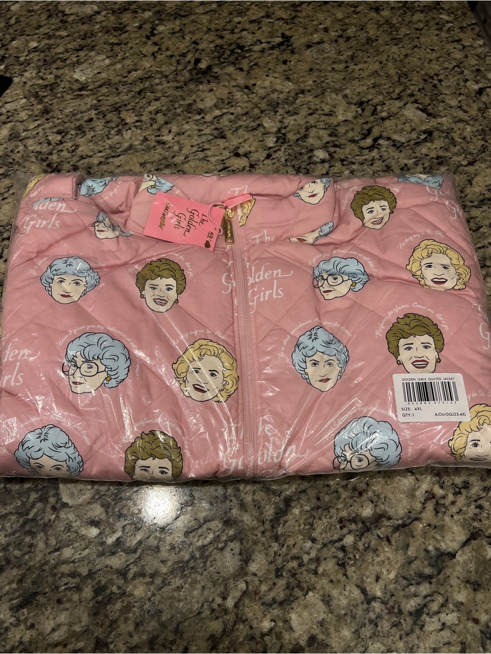 Pink Puff Jacket with All-Over Character Print